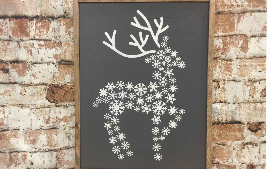deer patterned from snowflakes is not a canvas sip and paint class, this wine and paint workshop is DIY wood sign